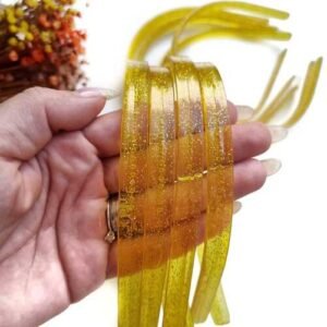 TIARA TRANSPARENTE DENTINHO DOURADO COM GLITTER 10MM UND