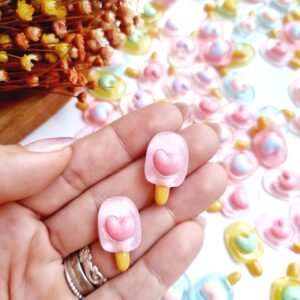 PICOLÉ COM CORAÇÃO EM RESINA 2,5CM ROSA BEBÊ C/ 2 UND
