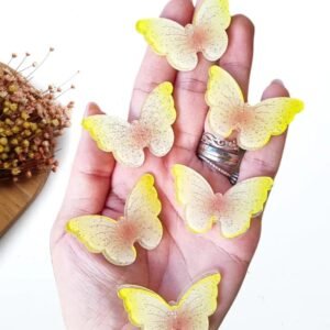 APLIQUE ACRÍLICO BORBOLETA GLITTER AMARELA C/ 2 UND