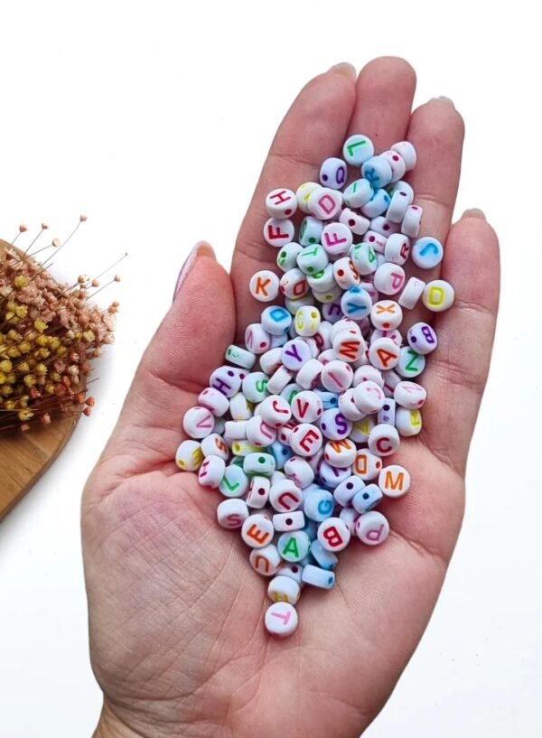 ENTREMEIO REDONDO 6MM BRANCO C/ LETRAS COLORIDAS 20G