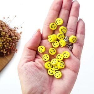 ENTREMEIO REDONDO EM FIMO 10MM SMILE AMARELO C/ 20 UND