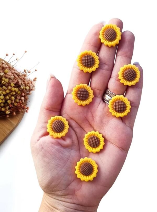 APLIQUE GIRASSOL EM RESINA AMARELO 2CM C/ 4 UND