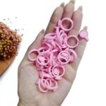ANEL C/ BASE EM PLÁSTICO ROSA 2CM C/ 10 UND