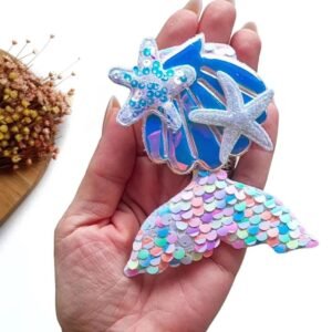 APLIQUE CALDA DE SEREA C/ ESTRELA DO MAR COLORIDO 12 CM UND