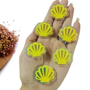 APLIQUE CONCHA EM RESINA 3,4CM AMARELO C/ 2 UND