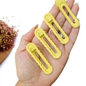 PRESILHA ONDULADA DE METAL 6CM AMARELO BEBÊ C/ 2 UND
