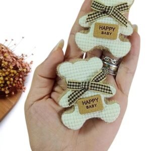 APLIQUE URSINHO PELUCIA C/ LAÇO HAPPY BABY NUDE 6CM  UND